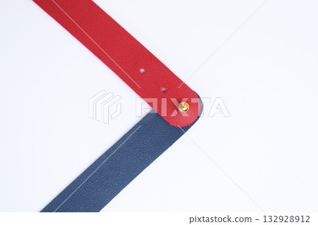 dark blue and red leather strap isolated on white background 132928912