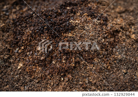Full frame shot of used coffee grounds. Coffee grounds have many practical uses around the home and garden and can even help spruce up your beauty routine. 132929844