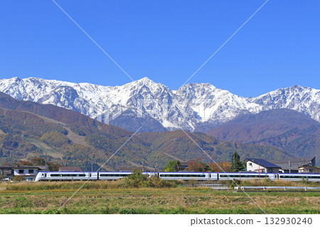 Oito Line Limited Express Azusa going to the foot of Mt. Hakuba in autumn Oito Line Limited Express Azusa going to the foot of Mt. Hakuba in autumn 132930240
