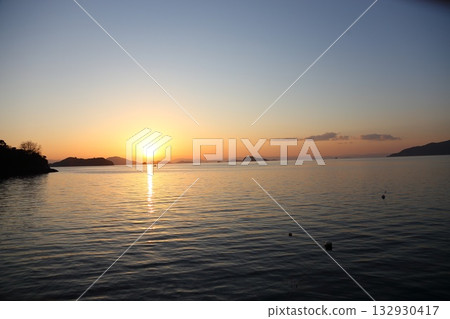 Sunset over the sea 132930417