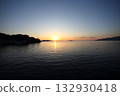 Sunset over the quiet ocean 132930418