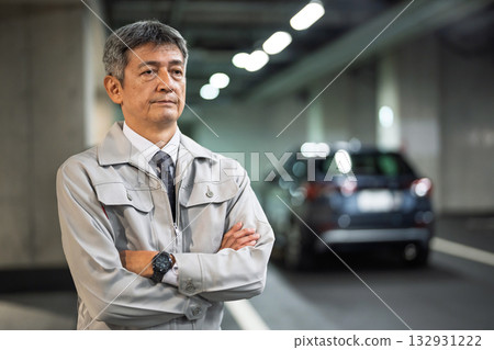 Middle-aged man wearing work clothes 132931222