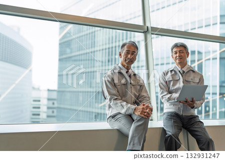 Senior man wearing work clothes 132931247