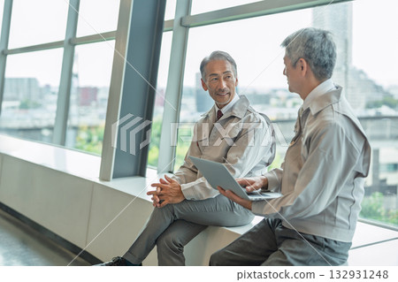 Senior man wearing work clothes 132931248