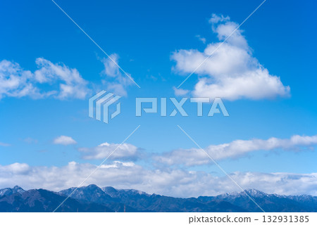 Winter blue sky and mountain range Winter blue sky and mountain range 132931385