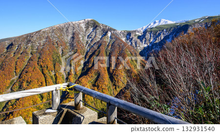 View of snow-capped Mt. Chokai and Mt. Inakura from the Hokotate Parking Lot Observation Deck, Chokai Blue Line, Akita Prefecture 132931540