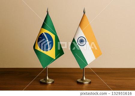 Brazilian and Indian flags lined up on a desk 132931616