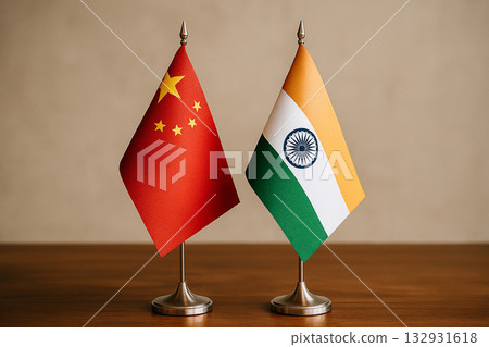 Chinese and Indian flags lined up on a desk 132931618