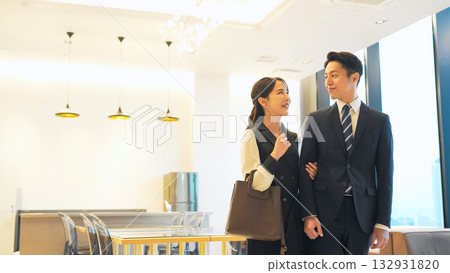 Couple cuddling in a restaurant 132931820