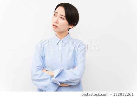 Woman wearing a long-sleeved shirt Woman wearing a long-sleeved shirt 132932261