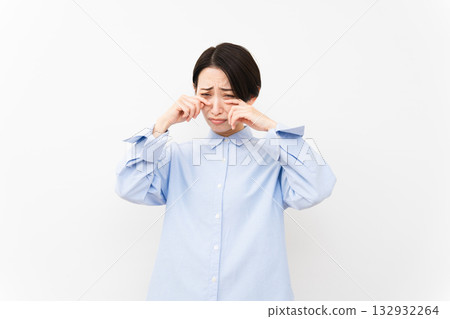 Woman wearing a long-sleeved shirt Woman wearing a long-sleeved shirt 132932264