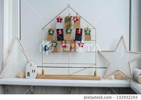 Step by step instruction of making handmade Christmas advent calendar. Creative craft homemade decor. New year celebration. Winter Step by step instruction of making handmade Christmas advent calendar. Creative craft homemade decor. New year celebration. Winter 132932293
