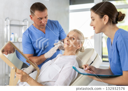 Attending medical consultation. 132932576