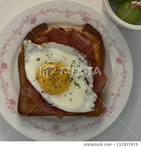 Golden, crispy toast topped with butter and jam, perfect for breakfast or snack-related projects. This image captures the warmth and comfort of a simple yet satisfying meal. Golden, crispy toast topped with butter and jam, perfect for breakfast or snack-related projects. This image captures the warmth and comfort of a simple yet satisfying meal. 132933919