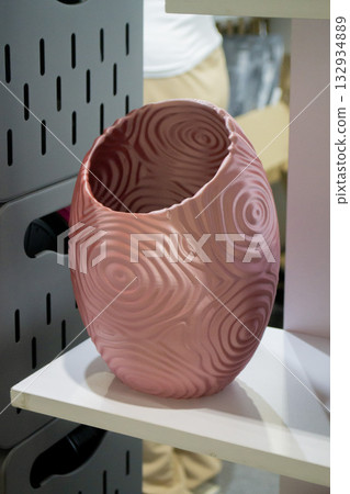 Object printed on 3D printer close up. Model printed on 3D printer from molten plastic. Vase printed on 3D printer from molten plastic of brown color. 3D printing technology. Additive FDM technologies Object printed on 3D printer close up. Model printed on 3D printer from molten plastic. Vase printed on 3D printer from molten plastic of brown color. 3D printing technology. Additive FDM technologies 132934889