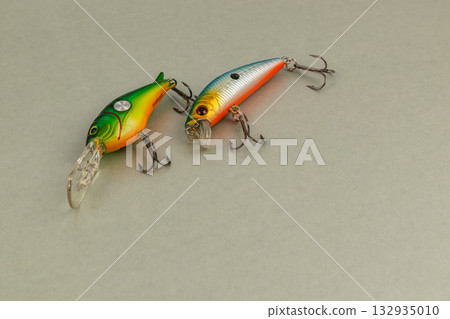 Colorful fishing lures on a simple background ready for use Colorful fishing lures on a simple background ready for use 132935010