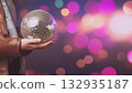 Person with disco ball and colorful lights, created AI 132935187