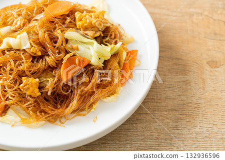 stir fried vermicelli with cabbage, carrot and egg stir fried vermicelli with cabbage, carrot and egg 132936596