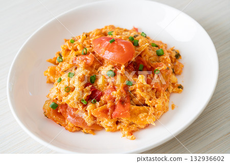 Stir-fried tomatoes with egg or Scrambled eggs with tomatoes Stir-fried tomatoes with egg or Scrambled eggs with tomatoes 132936602