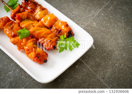grilled chicken skewer with herbs and spices 132936606