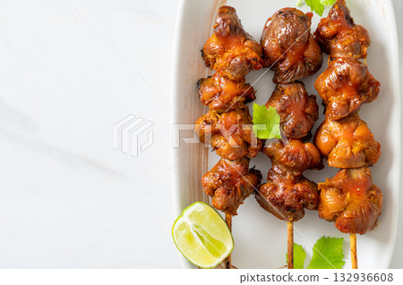 grilled chicken gizzard skewer with herbs and spices 132936608