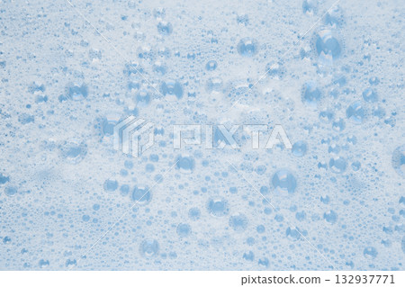 white soapy water on a blue background white soapy water on a blue background 132937771