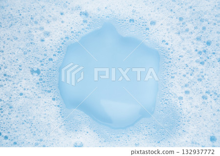 white soapy water on a blue background white soapy water on a blue background 132937772
