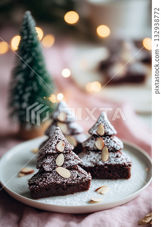 Delightful Christmas tree brownies on a festive plate with decorations 132938772