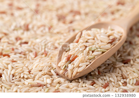 Thai brown rice seed (Highland wild rice) with wooden scoop Thai brown rice seed (Highland wild rice) with wooden scoop 132938980