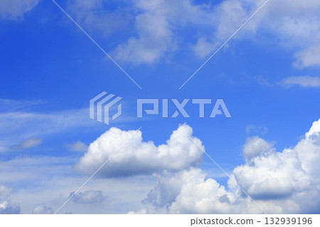 Blue sky with white fluffy clouds. Blue sky with white fluffy clouds. 132939196