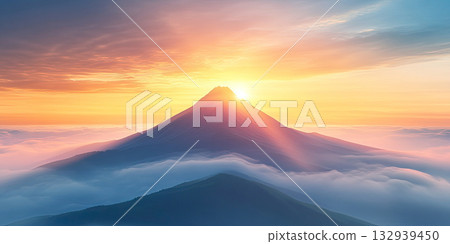Majestic Foggy Mountain Peak Bathed in Glowing Sunrise Light, Misty Horizon, Dreamy Golden Sky, Serene Morning Scene 132939450
