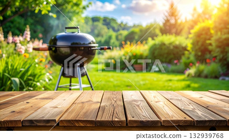 Traditional teapot on an old wooden table in a summer garden setting 132939768