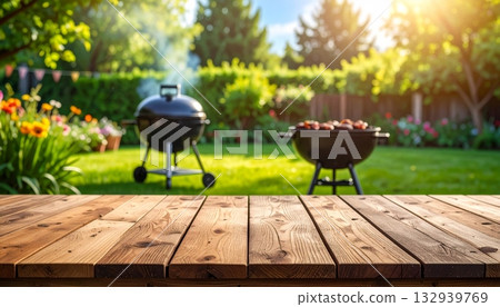 Traditional teapot on an old wooden table in a summer garden setting Traditional teapot on an old wooden table in a summer garden setting 132939769