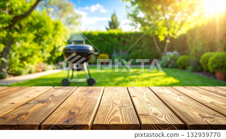 Traditional teapot on an old wooden table in a summer garden setting 132939770