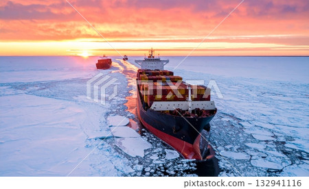 Nautical fishing vessels sail the ocean near the coast for commercial transport and summer industry, under the marine sky 132941116