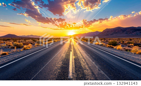 Empty desert highway stretches toward the fiery sunset horizon, symbolizing freedom and the long journey ahead beneath the vibrant sky Empty desert highway stretches toward the fiery sunset horizon, symbolizing freedom and the long journey ahead beneath the vibrant sky 132941143
