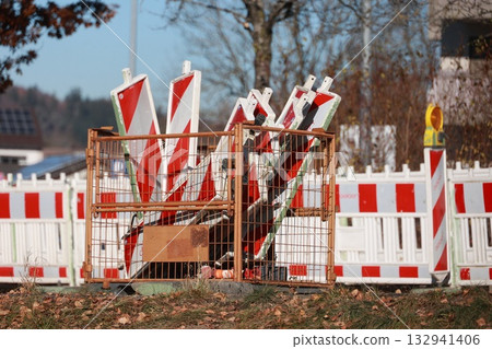 Construction site warning signs and barriers 132941406