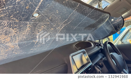 Foil sun visor for car windshield.  132941988