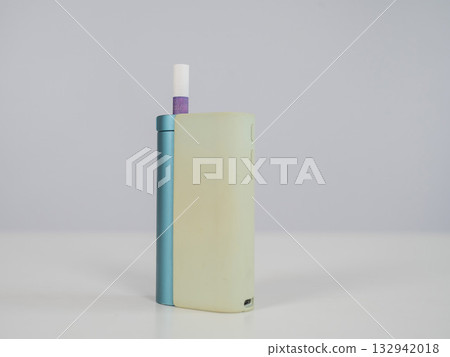 Electronic cigarette on a white background. Tobacco heating systems. Electronic cigarette on a white background. Tobacco heating systems. 132942018