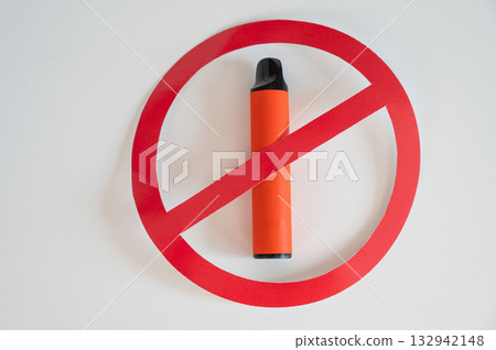 Prohibition sign on a disposable vape. Prohibition sign on a disposable vape. 132942148