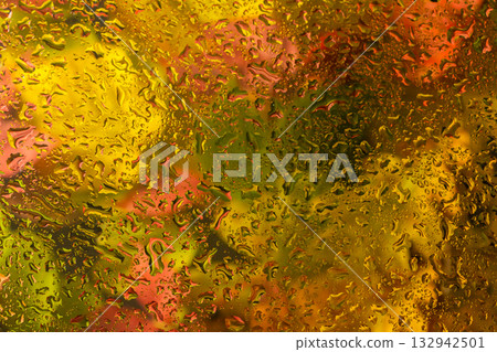 abstract background fall, glass drops autumn yellow leaves wet october weather 132942501