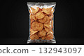 Transparent Bag of Crispy Cassava Chips on Black Background, Studio Shot 132943097