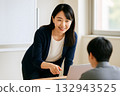 A Japanese female instructor giving advice to students 132943525