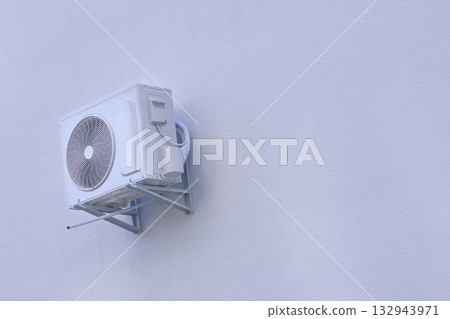 Air conditioning on a freshly plastered wall after renovation Air conditioning on a freshly plastered wall after renovation 132943971