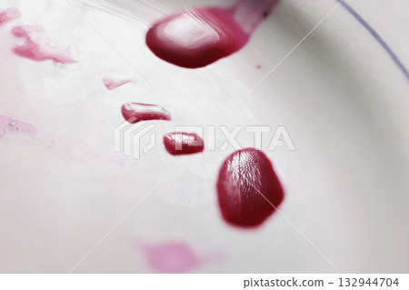 Blood splatters on white background Blood splatters on white background 132944704