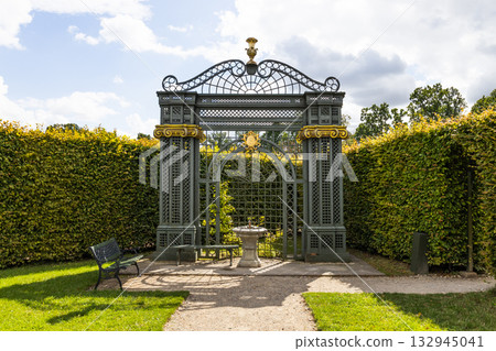 Rundale Palace Gardens, Latvia - Baroque hedge maze arch and formal topiary walkway 132945041