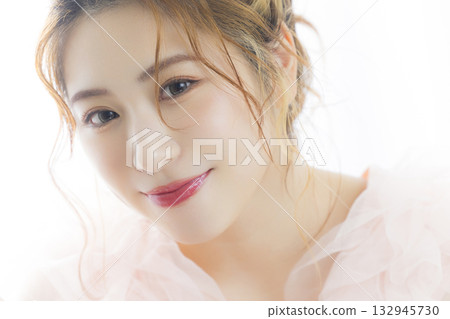 Woman in a pink tulle dress Woman in a pink tulle dress 132945730