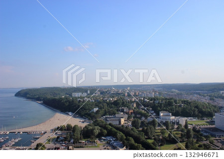 Panoramic view of Gdynia city and beach on Baltic Sea coast on sunny day Panoramic view of Gdynia city and beach on Baltic Sea coast on sunny day 132946671