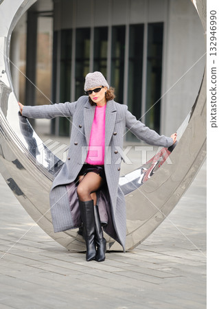 Urban street style combines bold colors and sleek fashion in a modern city setting 132946990