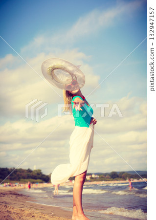 Attractive woman on the beach. 132947157